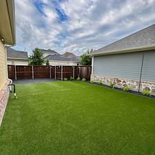 Backyard-Redesign-with-Artificial-Turf-Putting-Green-Landscape-Rock-Installation-in-McKinney-TX 5